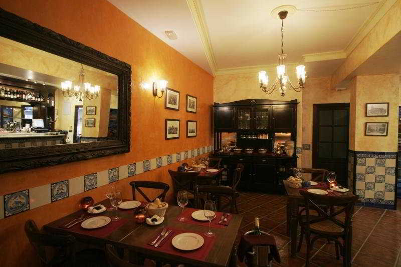 Casa Palacio De Los Leones إل بويرتو دي سانتا ماريا المطعم الصورة